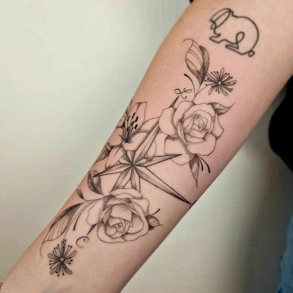 Compass with Climbing Rose Vines Tattoo Source @midori.tattoos via Instagram